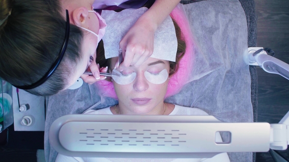 Eyelash Extension Procedure in a Beauty Salon alt
