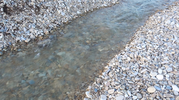Quick Mountain River Flowing in a Rocky Riverbed