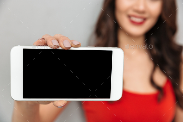 Cropped image of Smiling brunette woman in casual clothes - Stock Photo - Images