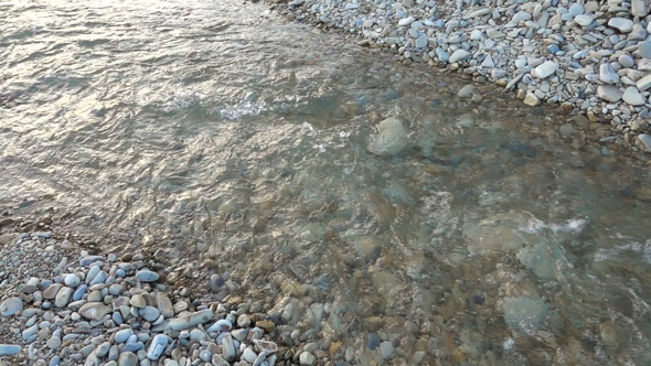 Mountain River, Water Flowing in a Quick Rocky Riverbed