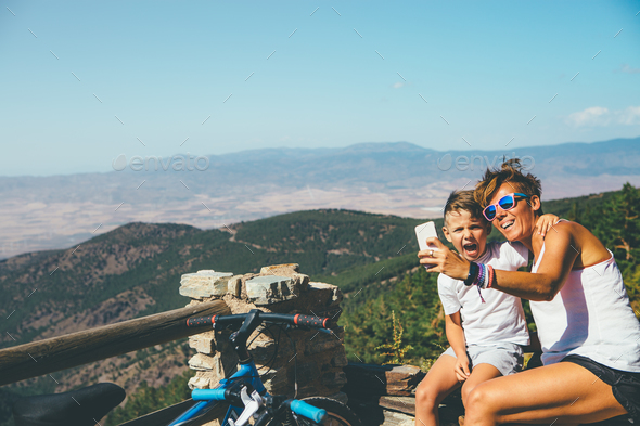 Happy mother and son at the mountain - Stock Photo - Images