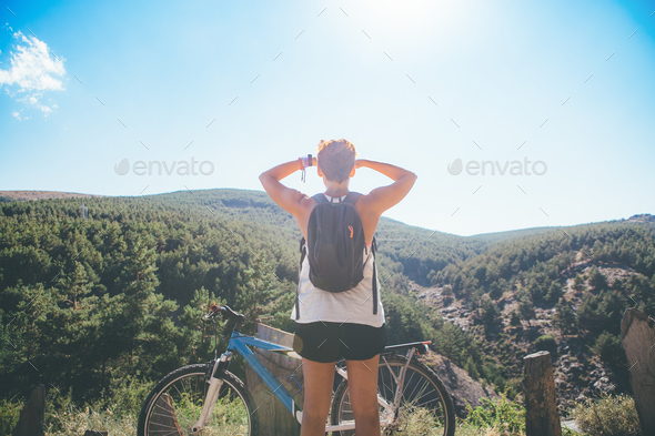 Sporty woman admires the view - Stock Photo - Images