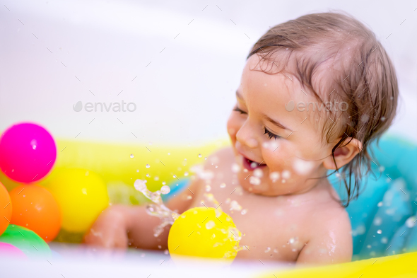 Excited boy in the bath - Stock Photo - Images