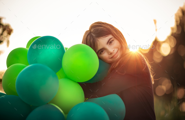Cute girl with air balloons - Stock Photo - Images