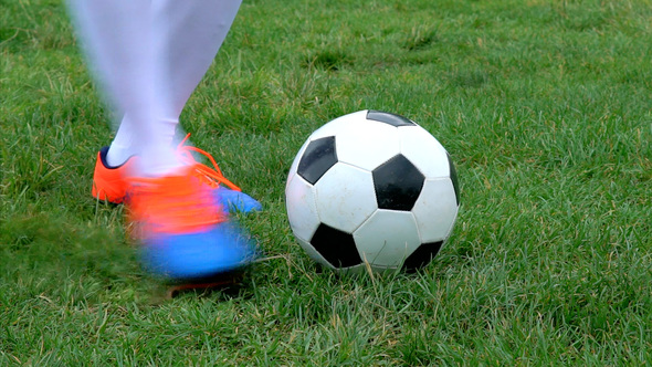 Football Player Hits the Ball, Stock Footage | VideoHive