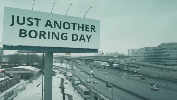 Billboard with JUST ANOTHER BORING DAY Text alt