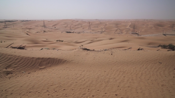 high voltage power lines in rub al khali desert united arab emirates