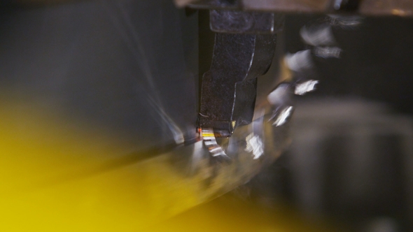 Milling Machine Processes Metal Chips Come Out alt