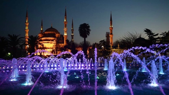 Illuminated Sultan Ahmed Mosque Blue Mosque Before Sunrise, View of the Evening Fountain. Istanbul