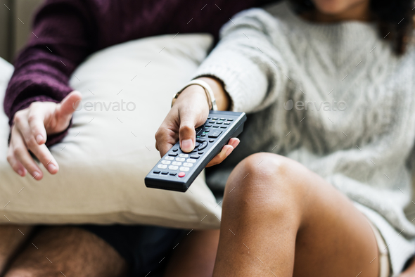 Couple watching a tv show together Stock Photo by Rawpixel | PhotoDune