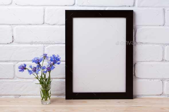 Black brown poster frame mockup with cornflower - Stock Photo - Images