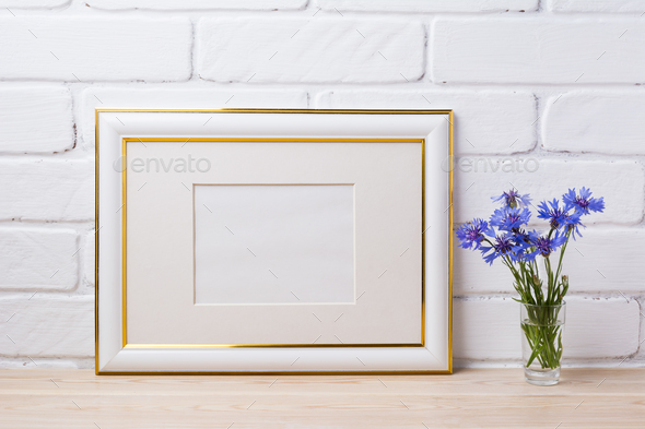 Gold decorated frame mockup with cornflower - Stock Photo - Images
