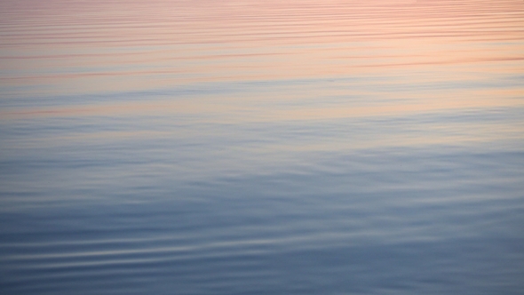 Majestic Sunset Reflected in Calm Water Surface