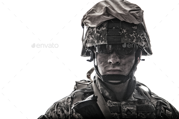 Equipped army soldier with dirty face studio shot - Stock Photo - Images