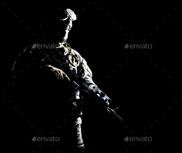 Armed infantryman during night military operation - Stock Photo - Images