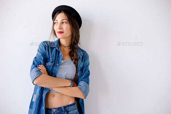 Portrait smiling young woman with hat - Stock Photo - Images