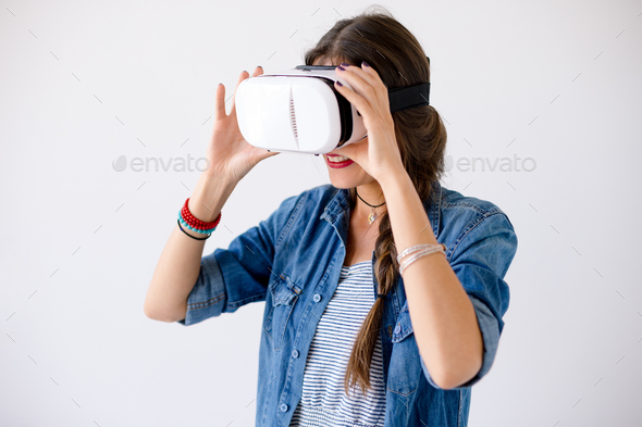 Happy hipster use VR glasses - Stock Photo - Images