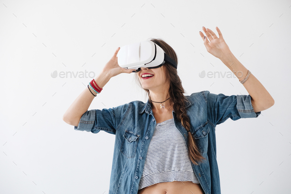 Attractive woman experiencing vr technology - Stock Photo - Images