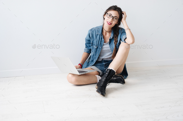 Smiling girl with laptop - Stock Photo - Images