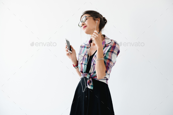 Pretty girl enjoying music - Stock Photo - Images