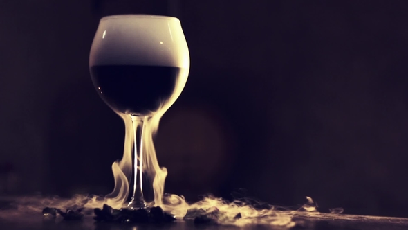 Red Wine in Glass with Dry Ice