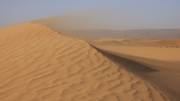 Sand Blowing in Sand Dunes in Wind, Sahara Desert alt