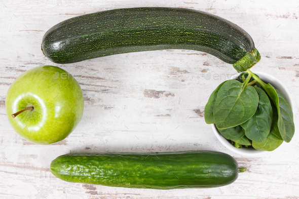 Green fruits and vegetables containing natural minerals, vitamins and fiber, copy space for text - Stock Photo - Images