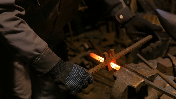 Blacksmith Working with Metal
