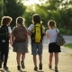 Group of Pupils with School Backpacks Are Going Back To School. They Are Having a Lot of Fun - VideoHive Item for Sale