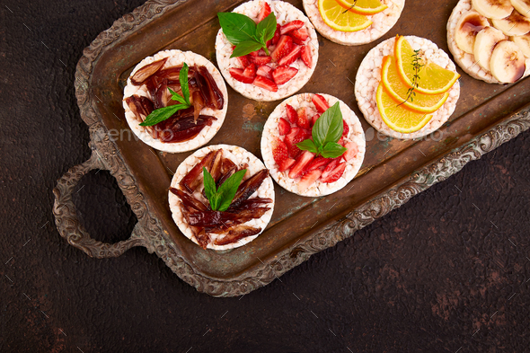 Snack with rice crispbread and fresh fruits - Stock Photo - Images