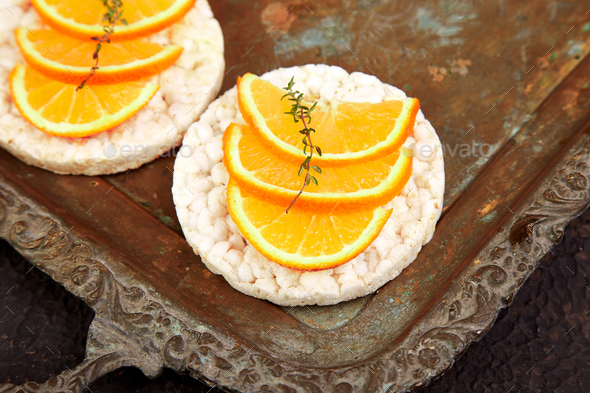 Snack with rice crispbread and fresh fruit - Stock Photo - Images