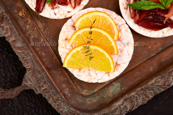 Snack with rice crispbread and fresh fruit - Stock Photo - Images