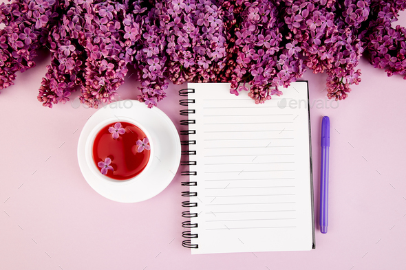Cup of tea, diary and bouquet lilac - Stock Photo - Images