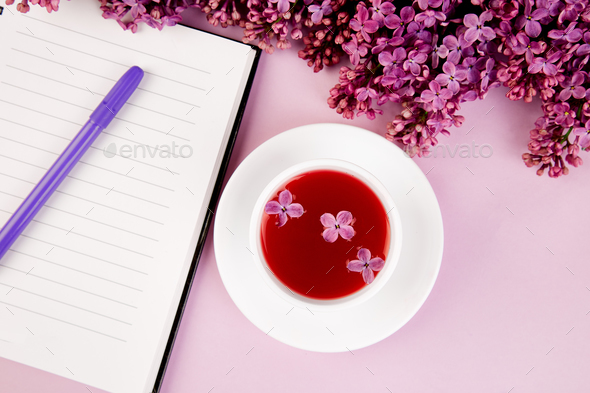 Cup of tea, diary and bouquet lilac - Stock Photo - Images