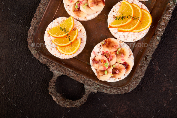Snack with rice crispbread and fresh fruits - Stock Photo - Images