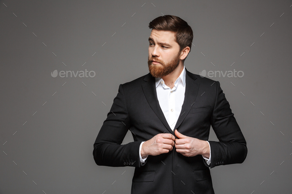 Portrait of a confident young businessman - Stock Photo - Images