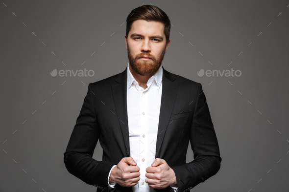 Portrait of a confident young businessman - Stock Photo - Images