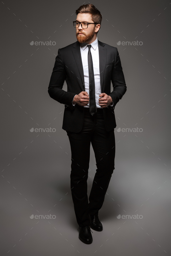 Full length portrait of a confident young businessman - Stock Photo - Images