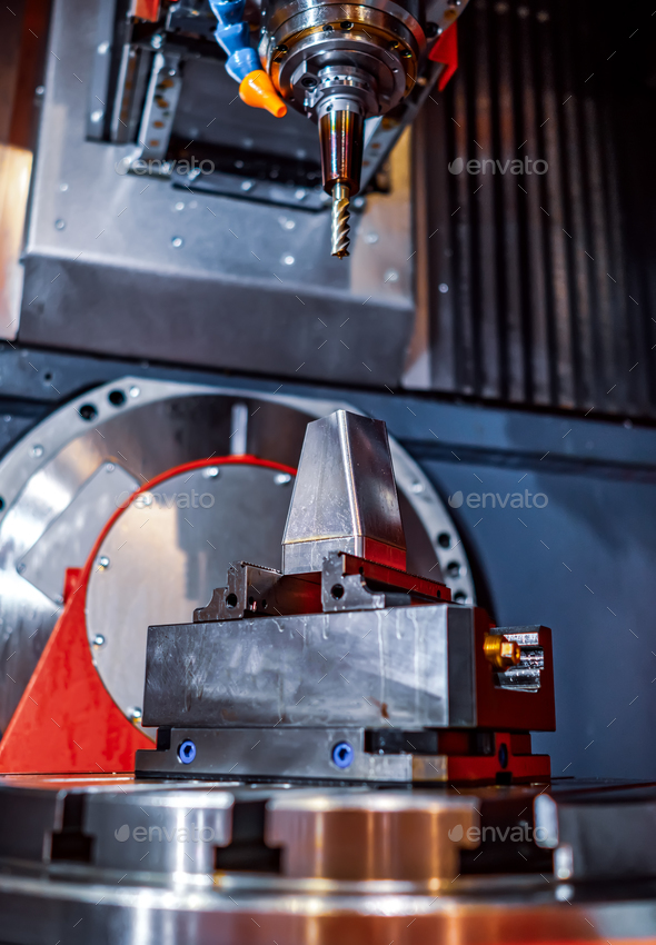 Metalworking CNC milling machine. Cutting metal modern processin Stock Photo by cookelma