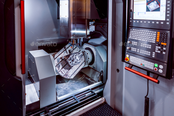 Metalworking CNC milling machine. Cutting metal modern processin - Stock Photo - Images