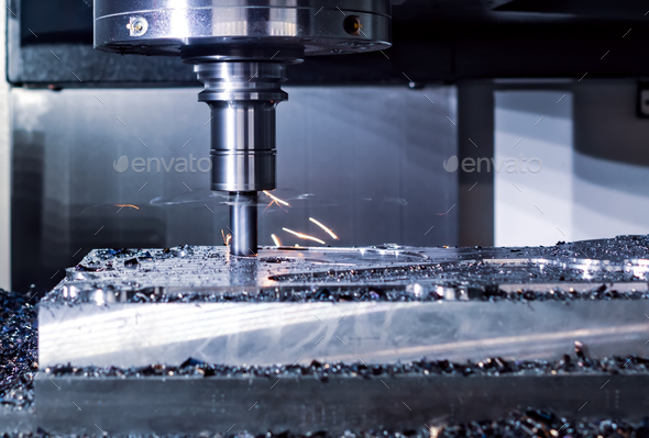 Metalworking CNC milling machine. Cutting metal modern processin Stock Photo by cookelma