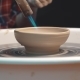 Burning of a Clay Dish on a Potter Wheel