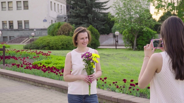 Beautiful Woman Having Video Using Smartphone Her Daughter. Girl Filming Video Photo Her Mom