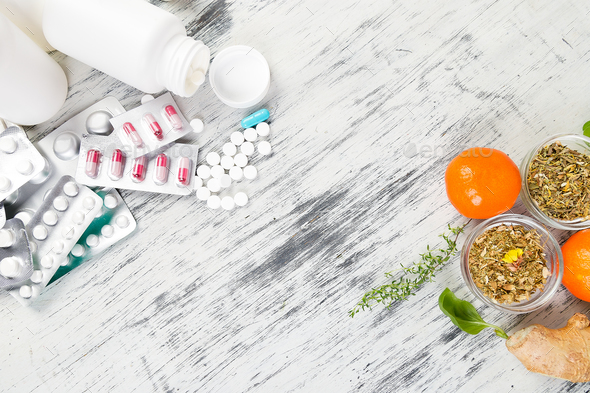 Natural medicine vs conventional medicine concept. - Stock Photo - Images