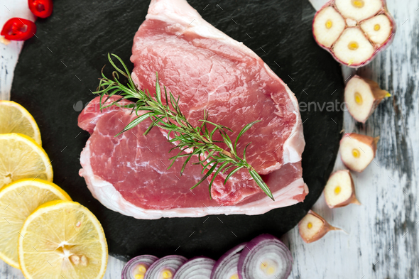 Raw pork meat with spice ingredient - Stock Photo - Images