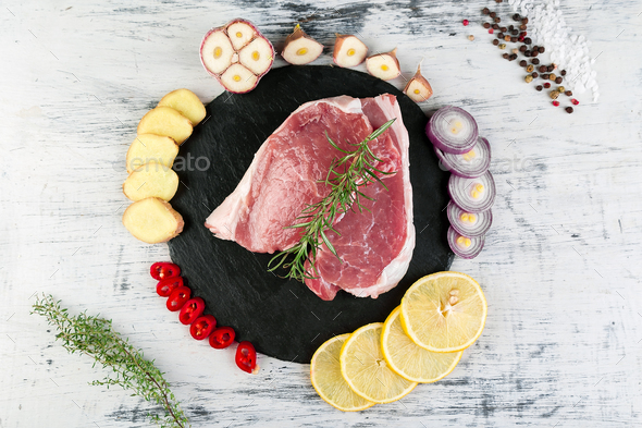 Raw pork meat with spice ingredient - Stock Photo - Images