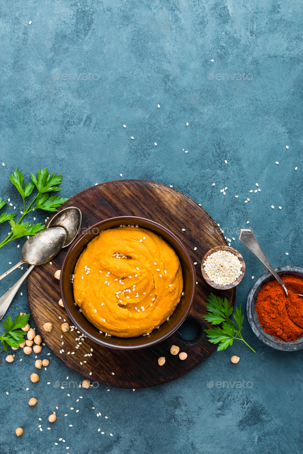 Hummus. Fresh homemade hummus with paprika - Stock Photo - Images