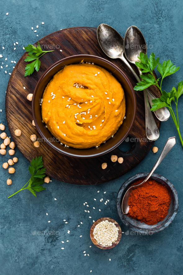 Hummus. Fresh homemade hummus with paprika - Stock Photo - Images