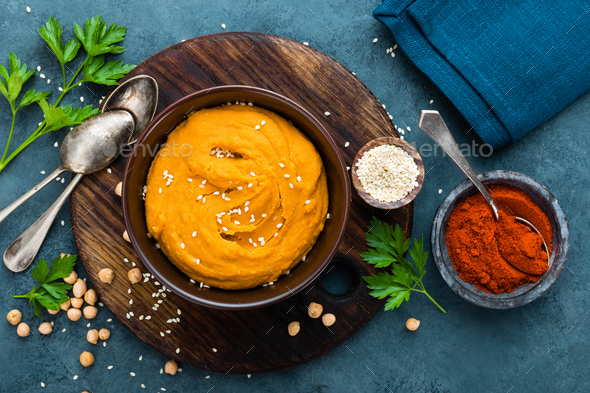 Hummus. Fresh homemade hummus with paprika - Stock Photo - Images
