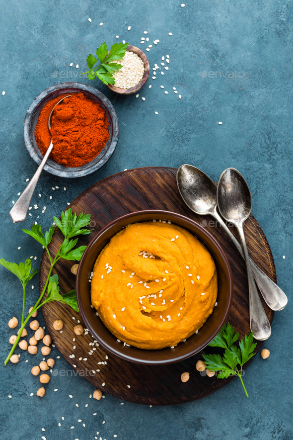 Hummus. Fresh homemade hummus with paprika - Stock Photo - Images